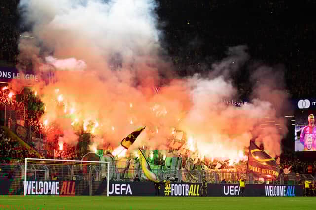 Celtic fans let off pyro during the Champions League match against Borussia Dortmund at the Signal Iduna Park. (Photo by Craig Williamson / SNS Group)