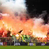 Celtic fans let off pyro during the Champions League match against Borussia Dortmund at the Signal Iduna Park. (Photo by Craig Williamson / SNS Group)