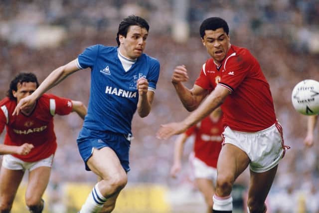 Sharp takes on Paul McGrath during the 1985 FA Cup final against Manchester United.