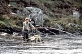 King Charles, then the Prince of Wales, enjoying fishing on the River Dee in 1982 at Balmoral, Scotland