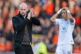 Hibs boss David Gray was left dejected at full-time after the 3-2 defeat to Dundee United.