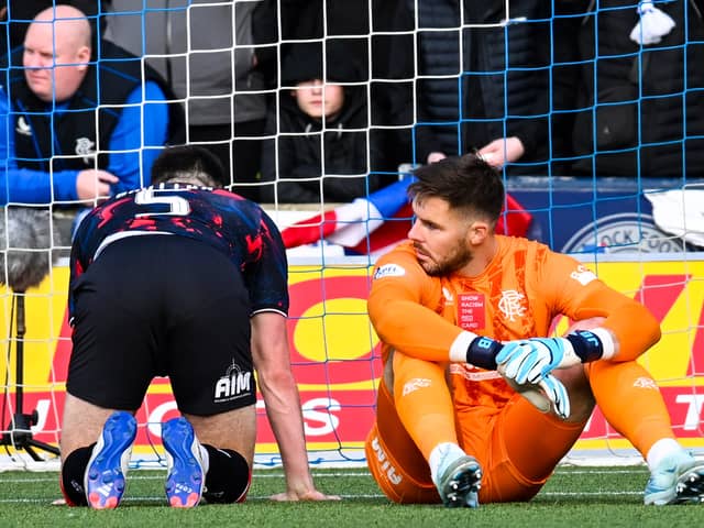Rangers defender John Souttar (left) and goalkeeper Jack Butland are left on the deck after Kilmarnock's Marley Watkins scores an 88th minute winner. (Photo by Rob Casey / SNS Group)
