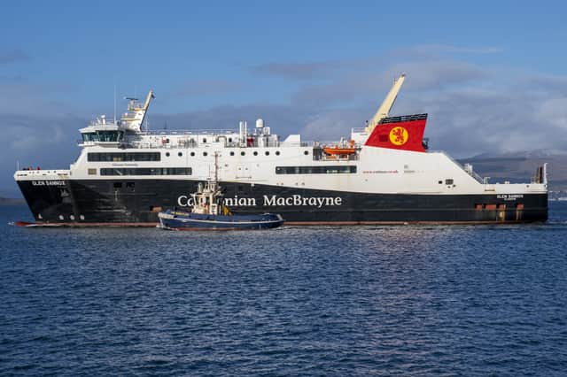 The MV Glen Sannox undergoes a sea trial, closely attended by tugs, earlier this year (Picture: Jane Barlow)