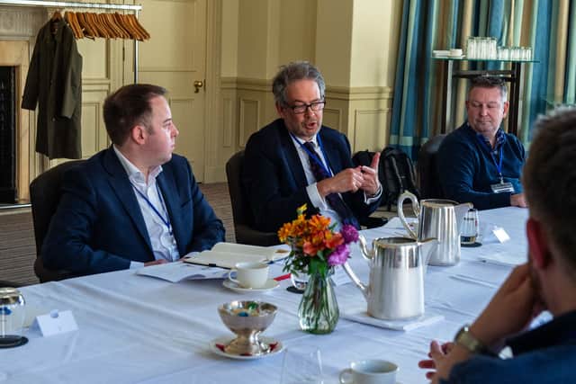 Robin Presswood, centre, Executive Director of City Development at Dundee City Council