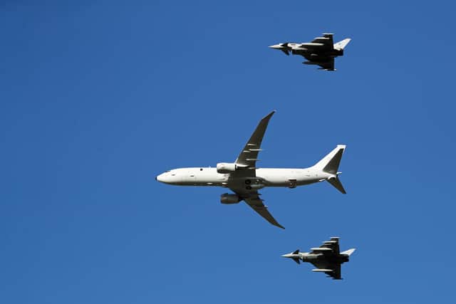 Escorted by two RAF Eurofighter Typhoons, the UK's first submarine-hunting P-8A Poseidon maritime patrol aircraft arrives in Scotland after crossing the Atlantic from NAS Jacksonville