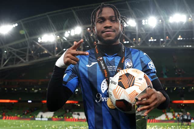 Ademola Lookman of Atalanta BC poses for a photo with the match ball after scoring a hat-trick against Bayer Leverkusen in the 2024 Europa League final. (Photo by Julian Finney/Getty Images)