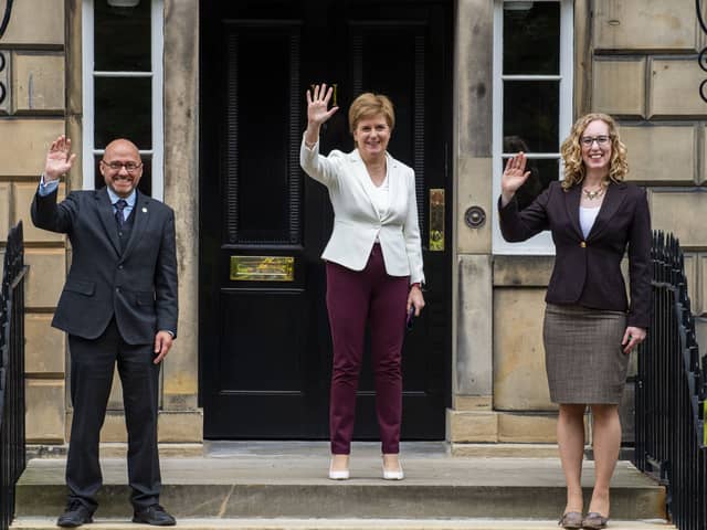 Scottish Green co-leaders Patrick Harvie and Lorna Slater with former first minister Nicola Sturgeon after signing the Bute House Agreement in 2021.