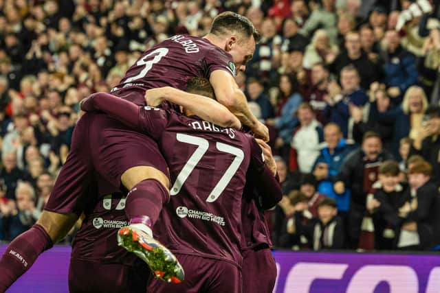 Hearts players celebrate Blair Spittal's goal against Omonoia.