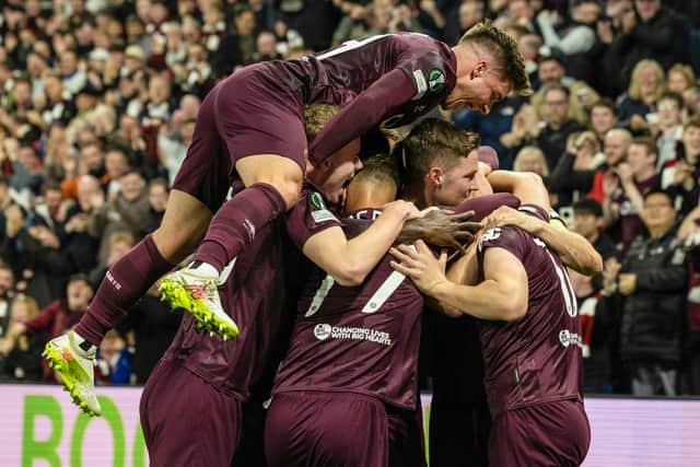 The Hearts players celebrate during the win over Omonoia.