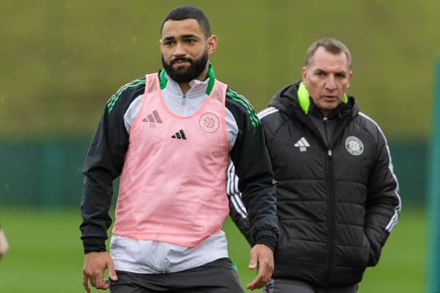 Celtic defender Cameron Carter-Vickers trains under the watchful eye of manager Brendan Rodgers.