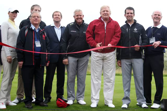 Donald Trump opens his course in Aberdeen in 2012 flanked by, from left, Ivanka Trump, Eric Trump (rear), Martin Hawtree, George O'Grady, Colin Montgomerie, Don Trump Jr and Sandy Jones.