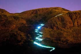 Don't worry, this is not a portal to the supernatural world, but a work of public art called the Speed of Light on Arthur's Seat (Picture: Scott Campbell)