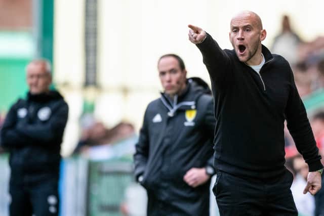 Hibs boss David Gray gives orders from the touchline.