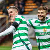 Celtic's Luke McCowan celebrates with James Forrest as he opens the scoring in the 3-0 win over Motherwell at Fir Park. (Photo by Craig Williamson / SNS Group)
