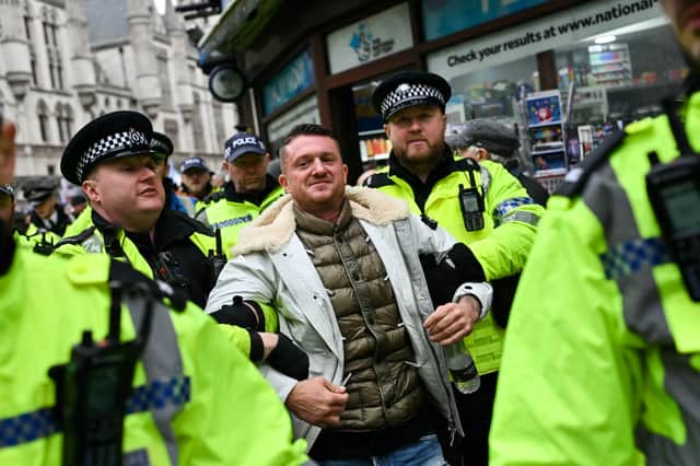 Police arrest far-right activist Tommy Robinson during a demonstration in central London last year (Picture: Justin Tallis)