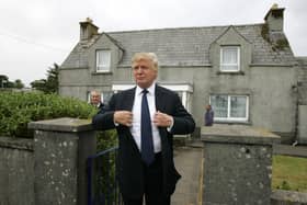 Tycoon Donald Trump pictured at the house in Tong, on the Isle of Lewis, where his mother was brought up before she emigrated to the United States. 