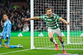 Celtic's Alistair Johnston celebrates scoring to make it 1-0 over Dundee. (Photo by Ross MacDonald / SNS Group)
