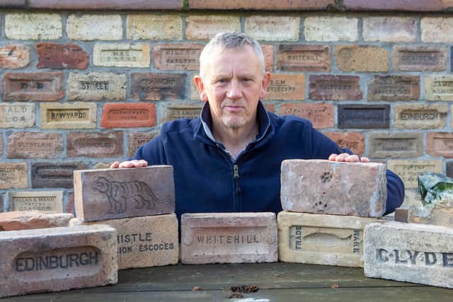 Mark Cranston from Jedburgh, with his collection of over 4,000 bricks. Picture: Katielee Arrowsmith/SWNS