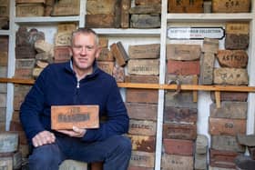 Mark Cranston from Jedburgh, with his collection of over 4,000 bricks. Picture: Katielee Arrowsmith/SWNS