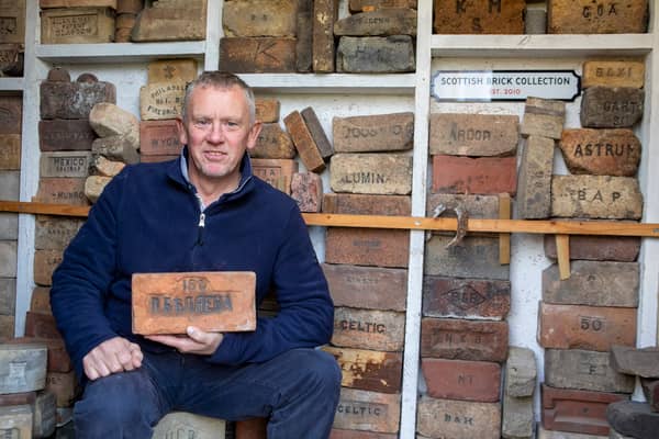 Mark Cranston from Jedburgh, with his collection of over 4,000 bricks. Picture: Katielee Arrowsmith/SWNS