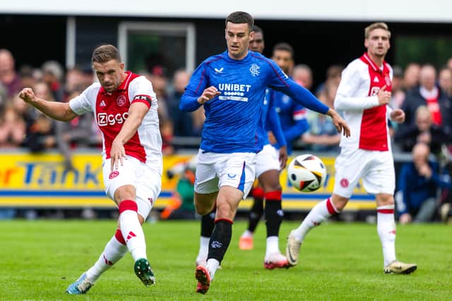 Jordan Henderson and Rangers Tom Lawrence in action during the pre-season friendly against Ajax. Cr: SNS Group.