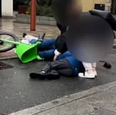 E-bike rider crashes into a child crossing a cycle lane to reach a "floating" bus stop.