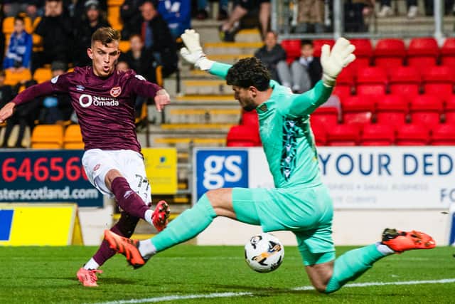 Kenneth Vargas nets Hearts' winner at McDiarmid Park.