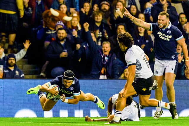 Darcy Graham scores the first of his four tries at Murrayfield.