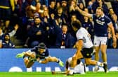 Darcy Graham scores the first of his four tries at Murrayfield.