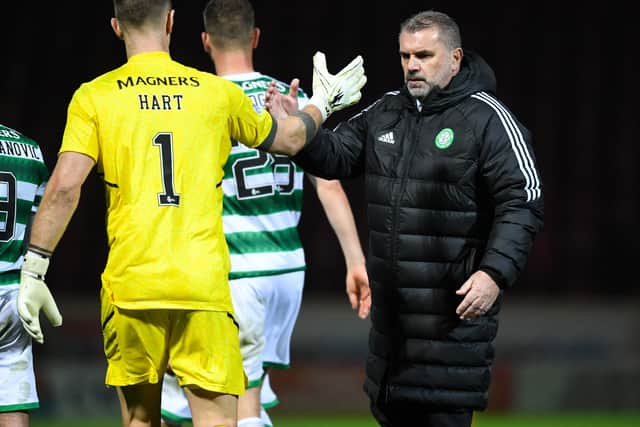 Former Celtic goalkeeper Joe Hart is congratulated by ex-boss Ange Postecoglou during the pairs time together at Celtic Park. Cr: SNS Group.