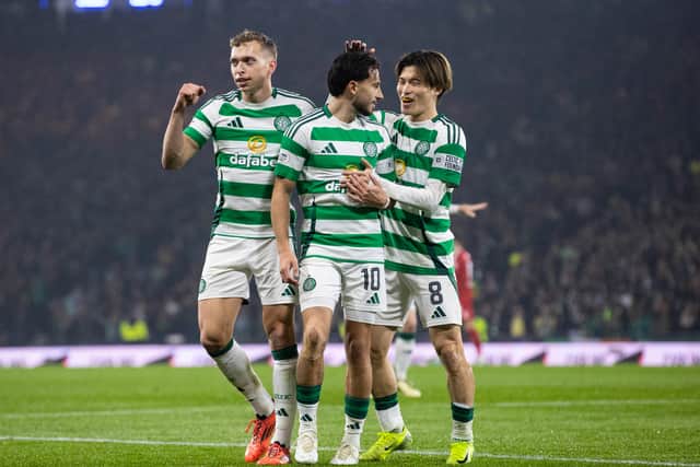 Celtic duo Nicolas Kuhn (centre) and Alistair Johnston (left) are two of the club's biggest assets.