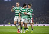 Celtic duo Nicolas Kuhn (centre) and Alistair Johnston (left) are two of the club's biggest assets.