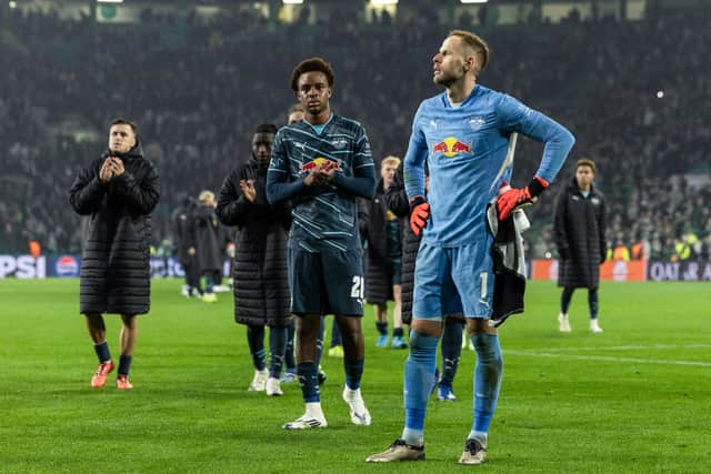Despondent RB Leipzig players at full-time after the 3-1 defeat at Celtic Park. (Photo by Craig Foy / SNS Group)