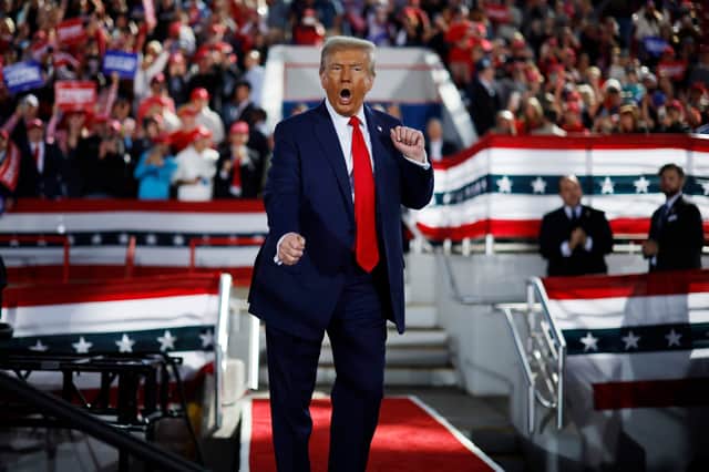 US president-elect Donald Trump dances off stage at the conclusion of a campaign rally at the J.S. Dorton Arena in North Carolina. Picture: Chip Somodevilla/Getty Images
