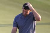 Rory McIlroy reacts on the 18th green in the second round of the Abu Dhabi HSBC Championship at Yas Links. Picture: Ross Kinnaird/Getty Images.