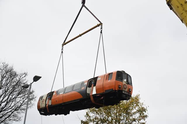 A former Glasgow Subway carriage lifted into the grounds of the Ivy In The Park childcare centre in the Carntyne area of Glasgow on November 8