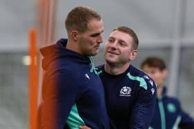 Finn Russell (R) and Duhan van der Merwe (L) during a Scotland training session at Oriam.