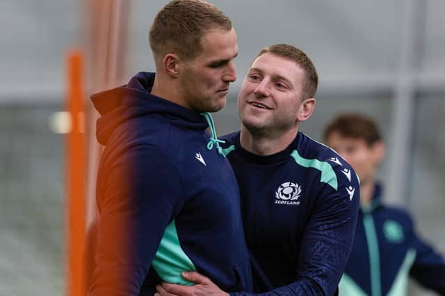 Finn Russell (R) and Duhan van der Merwe (L) during a Scotland training session at Oriam.