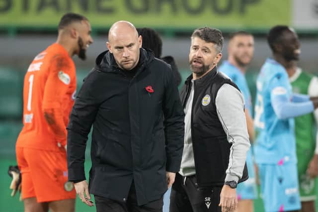 Hibs head coach David Gray looks dejected as he walks away from St Mirren manager Stephen Robinson after the 2-1 defeat at Easter Road. (Photo by Paul Devlin / SNS Group)