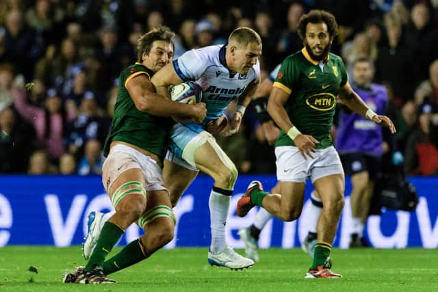 Eben Etzebeth brings down Duhan van der Merwe during South Africa's win over Scotland.