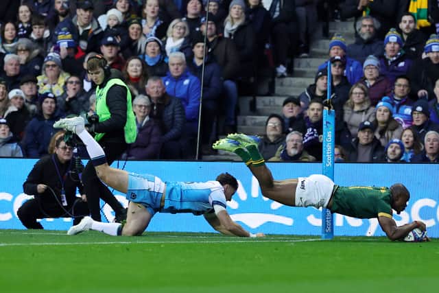 Makazole Mapimpi scores South Africa's first try against Scotland.
