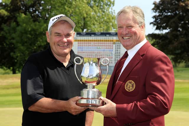 Jim Farmer, who was The PGA Cup captain at the time, presents David J Russell with the trophy after the Englishman’s win in the DeVere Collection PGA Seniors Championship at Slaley Hall in 2010.