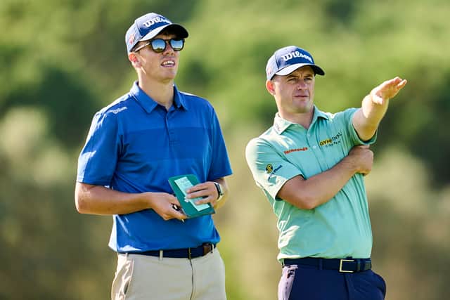David Law and his caddie Shane O’Connell weigh up a shot during day four of the DP World Tour Qualifying School Final Stage at Infinitum Golf in Tarragona.