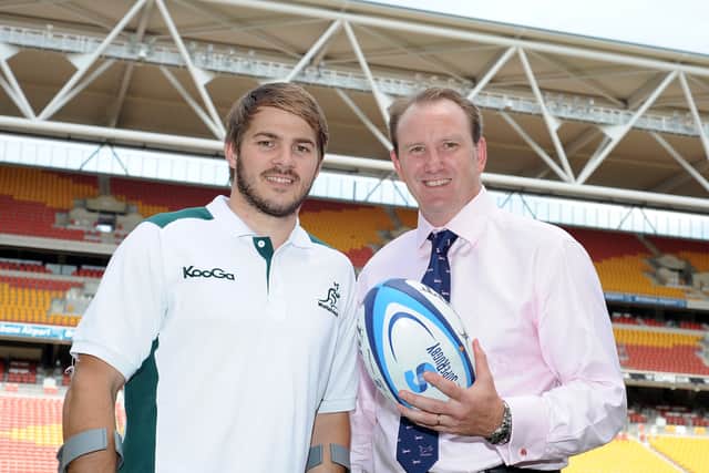Brett Robinson, pictured right with Drew Mitchell, is standing to be chair of World Rugby.