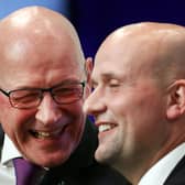 John Swinney and Stephen Flynn share a lighter moment earlier this year (Picture: Jeff J Mitchell)