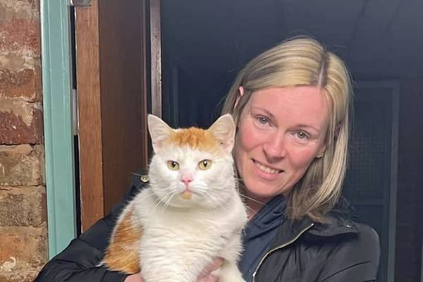 Cara McBurnie and Beans the cat who went missing only to be discovered 300 miles away from their home in Cumbernauld (Picture: Cats Protection)