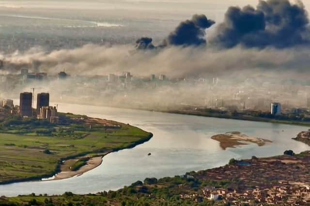 Smoke rises above Sudan's capital Khartoum during fighting in April last year (Picture: Abdelmoneim Sayed)