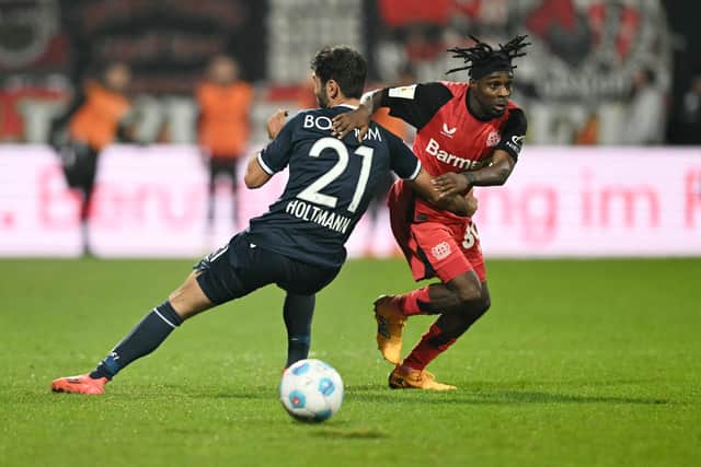 Former Celtic defender Jeremie Frimpong, right, in action for Bayer Leverkusen. (Photo by INA FASSBENDER/AFP via Getty Images)