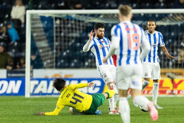 Celtic's Reo Hatate fouls Kilmarnock's Liam Donnelly with a tackle that an SFA panel deemed to be a missed red card. (Photo by Craig Foy / SNS Group)