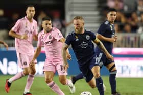 Sporting Kansas' Johnny Russell up against Jordi Alba of Inter Miami in an MLS match last year. (Photo by Cliff Hawkins/Getty Images)